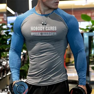 NOBODY CARES WORK HARDER  QUICK DRY MOISTURE WICKING RAGLAN GRAPHIC LONG SLEEVE T-SHIRT